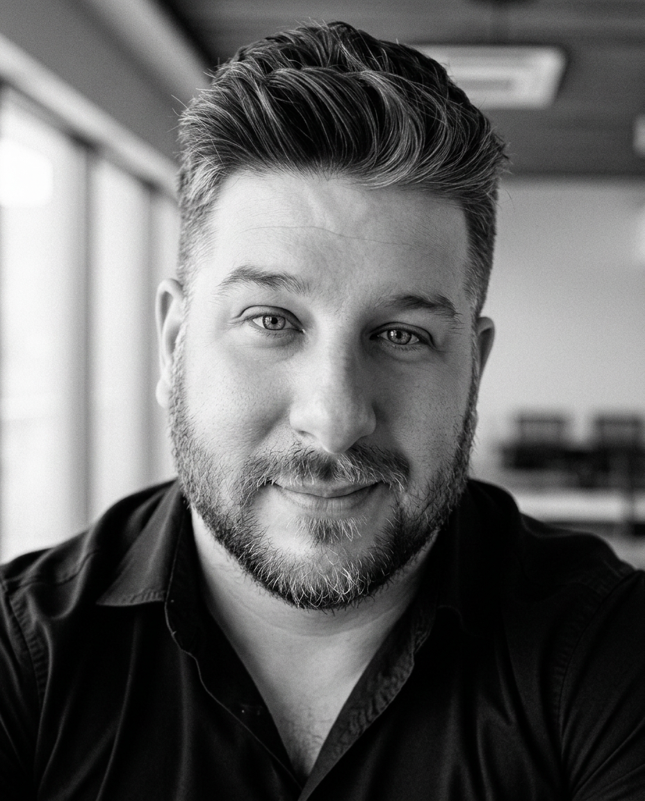 Black and white portrait of Ryan Victor Mark
